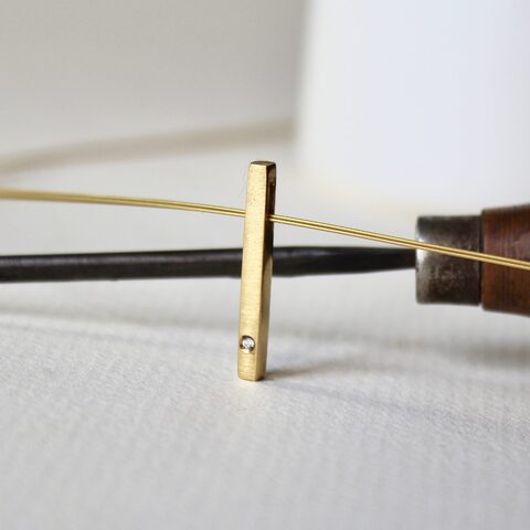 Colgante Nara Diamante y plata con baño de oro