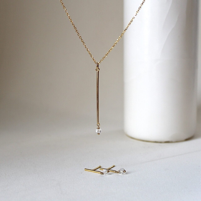 Pendientes AIDA en plata con baño de oro pequeño
