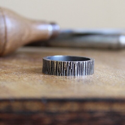 Anillo MAN Roc Plata envejecida.