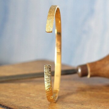Pulsera Rusk Plata con baño de Oro